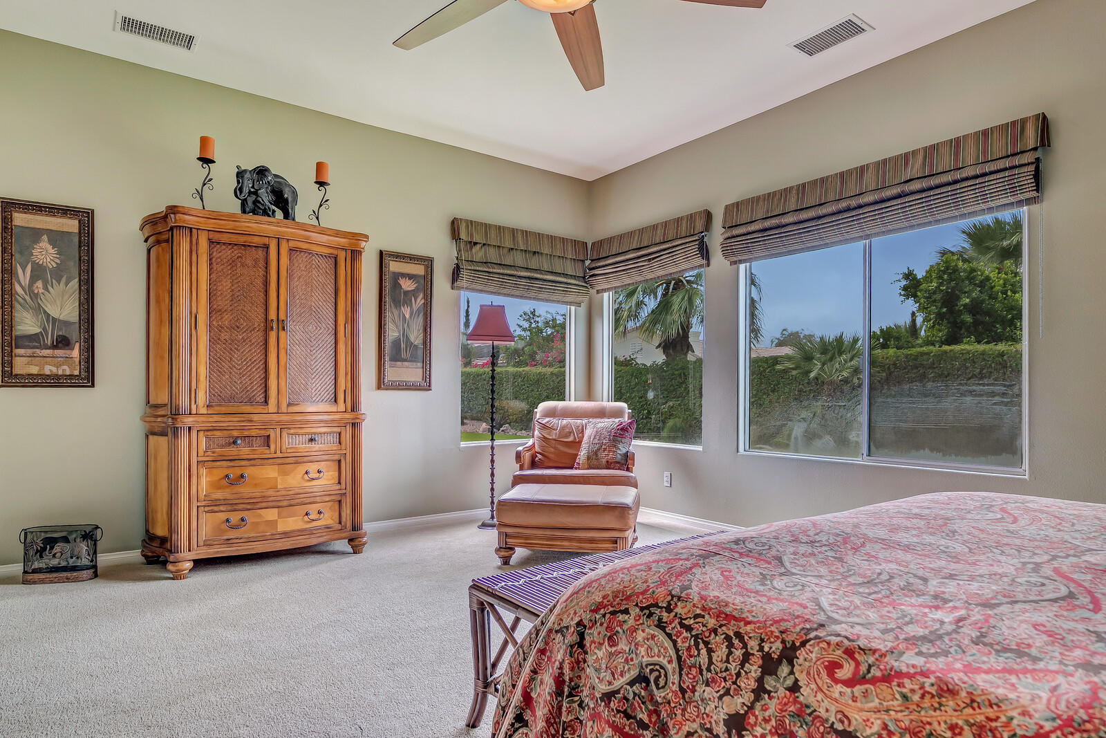 3 Lyon Road Rancho Mirage, CA 92270 - Photo 14 of 38 a bedroom with a bed and large window