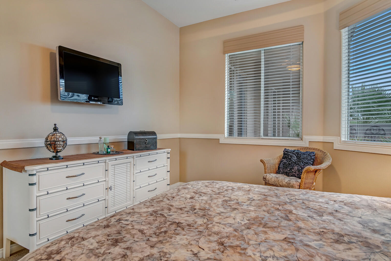 3 Lyon Road Rancho Mirage, CA 92270 - Photo 20 of 38 a bedroom with a bed and flat screen tv
