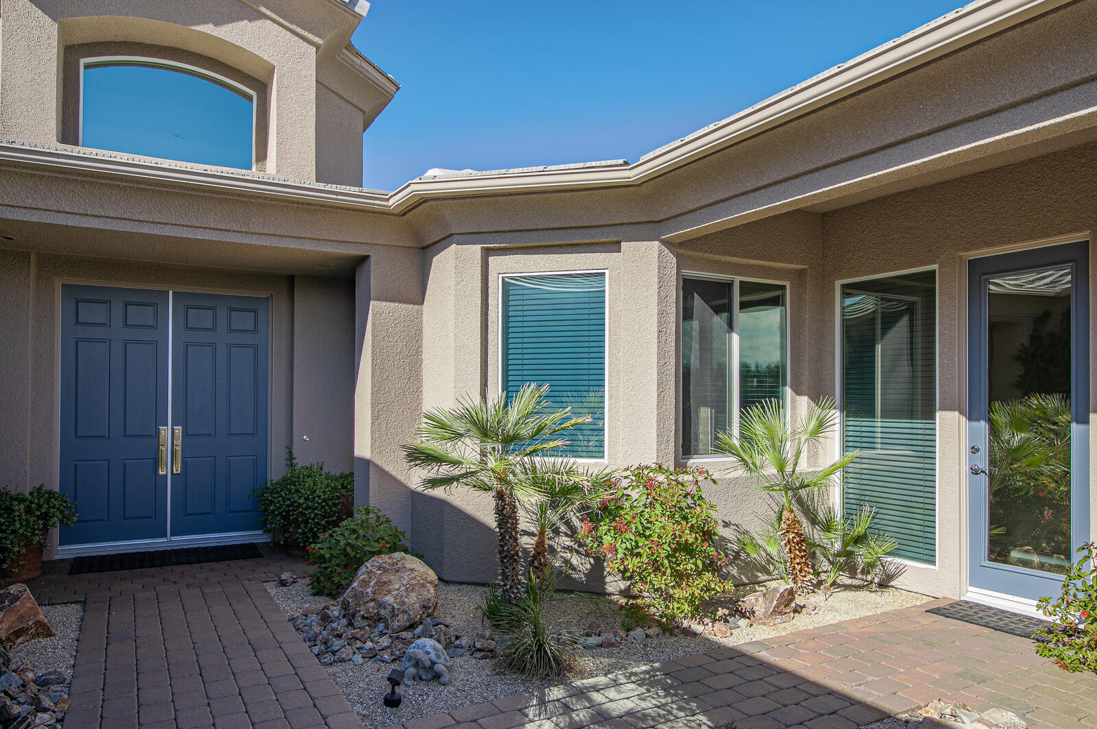 3 Lyon Road Rancho Mirage, CA 92270 - Photo 3 of 38 a front view of a house