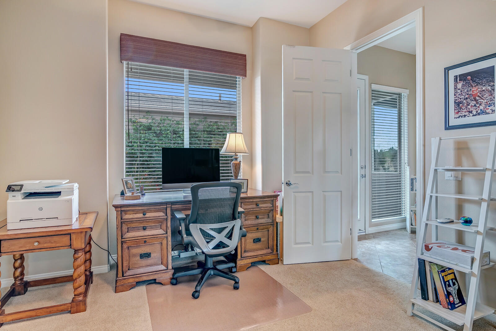 3 Lyon Road Rancho Mirage, CA 92270 - Photo 23 of 38 a view of a workspace with furniture and a window