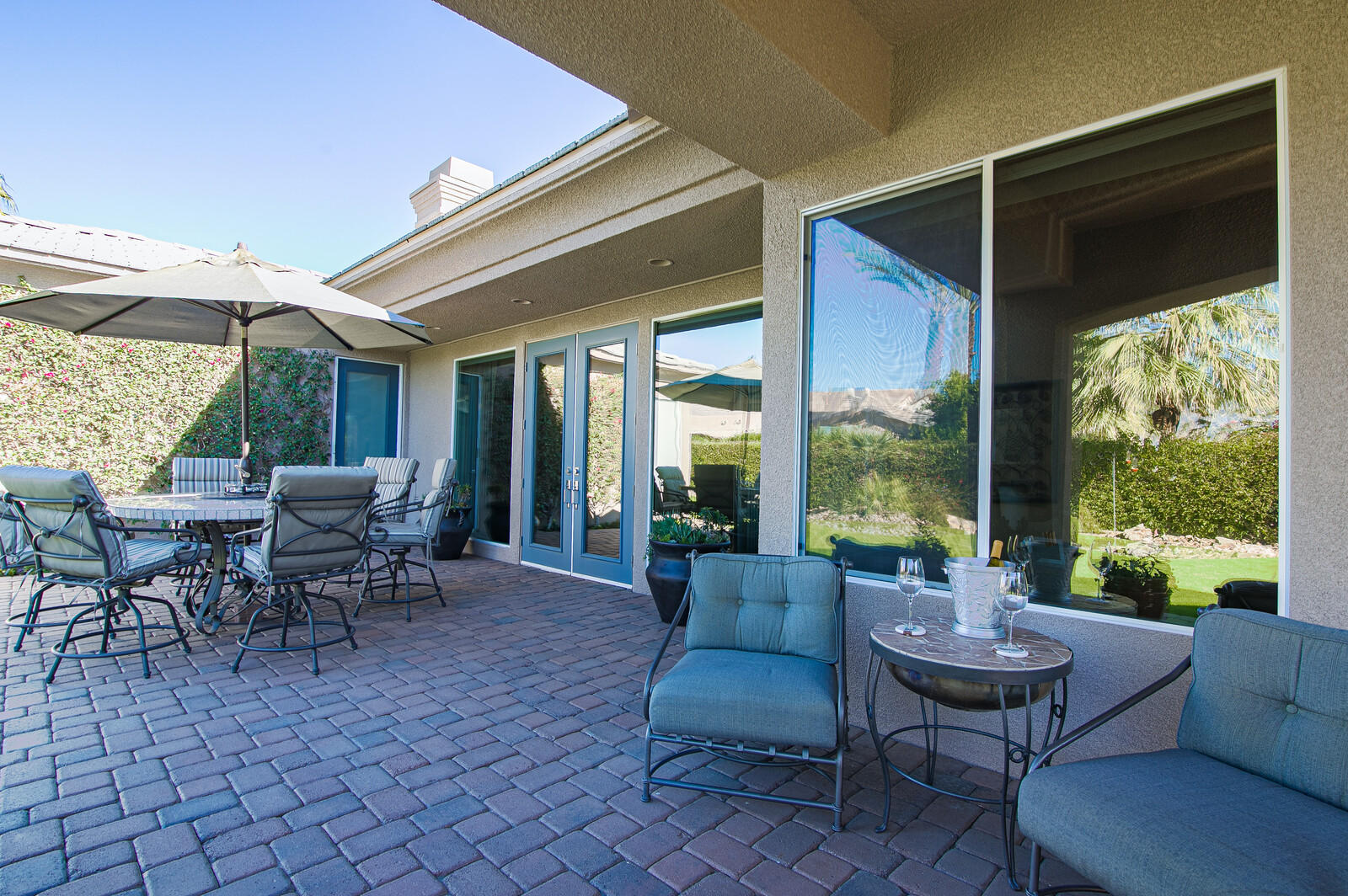 3 Lyon Road Rancho Mirage, CA 92270 - Photo 27 of 38 a living room with furniture and a large window