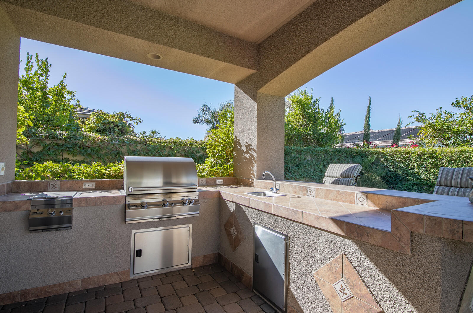 3 Lyon Road Rancho Mirage, CA 92270 - Photo 28 of 38 a view of kitchen with sink and refrigerator