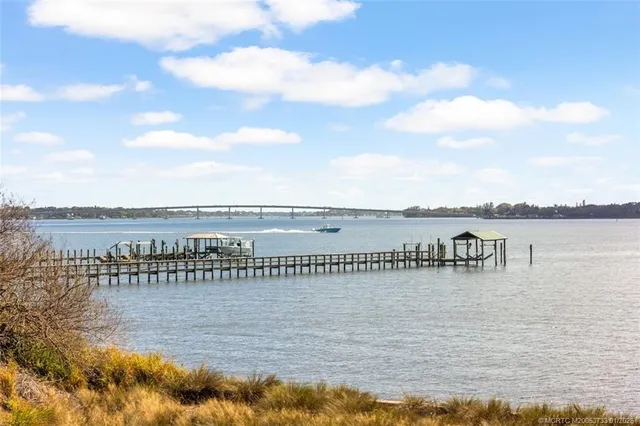 a view of a lake with a building in the background