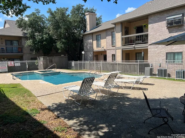 a front view of a house with swimming pool