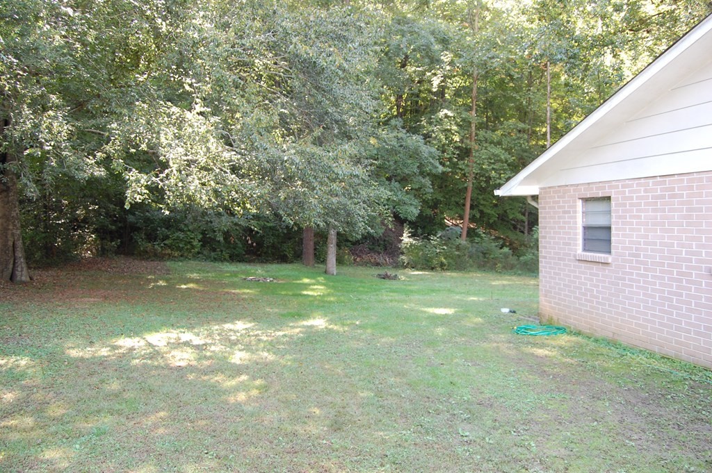 0 Proffitt Hill Lane Decatur, TN 37322 - Photo 4 of 16 a view of backyard with a garden and entertaining space