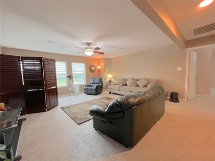 a bath room with a bath tub and a sink