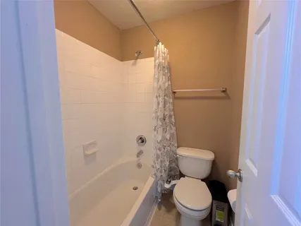 a view of house with swimming pool yard and outdoor seating