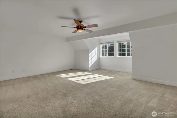 a view of empty room with windows