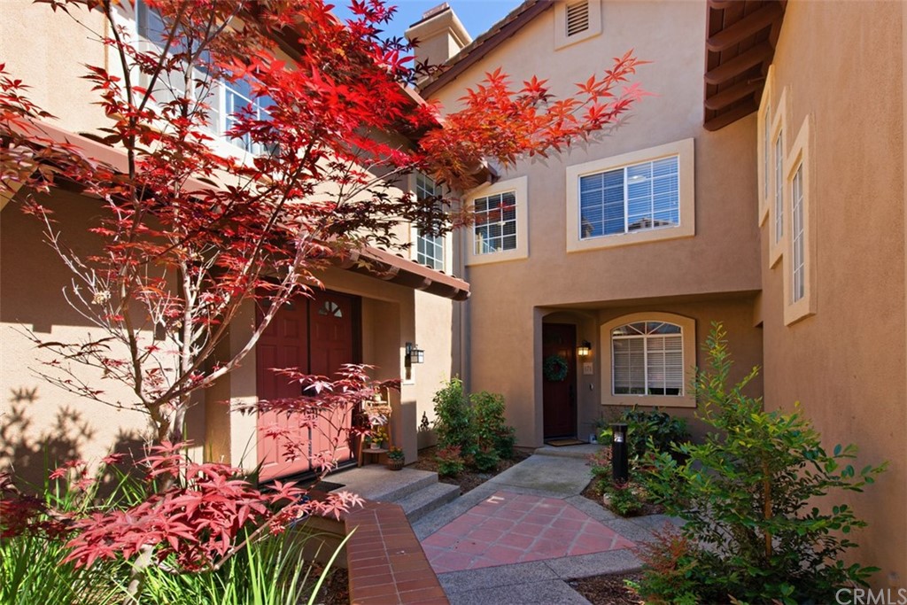 171 Pasto Rico Rancho Santa Margarita, CA 92688 - Photo 1 of 1 Lush Front Entry Walkway