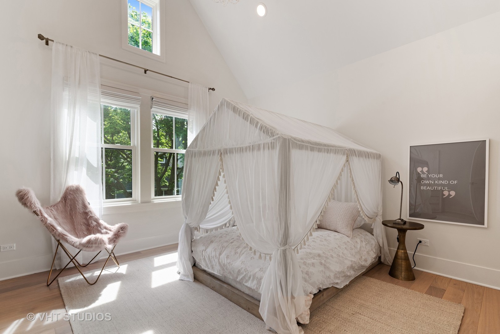 300 Greenleaf Avenue Wilmette, IL 60091 - Photo 20 of 43 a spacious bedroom with a bed and glass window