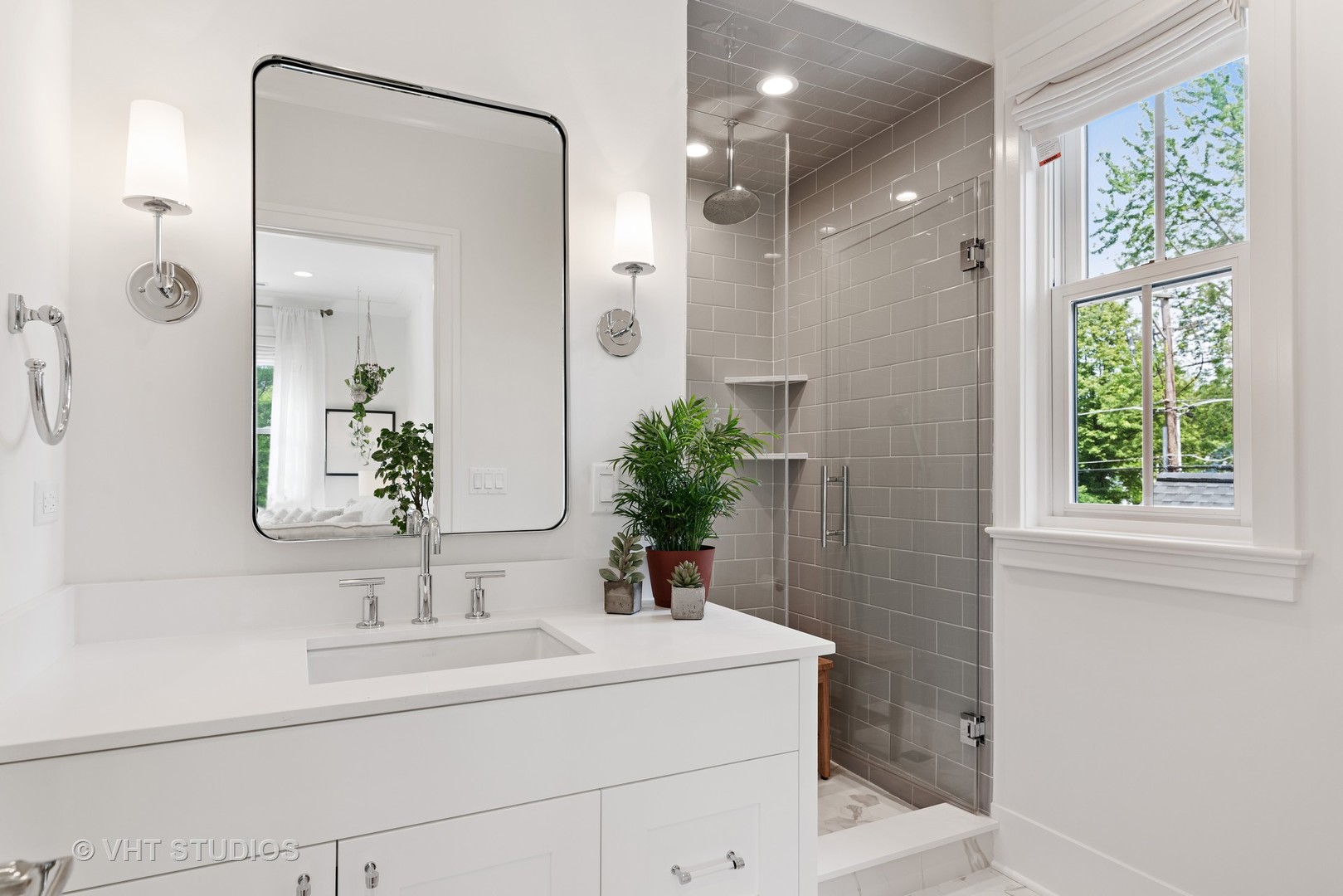 300 Greenleaf Avenue Wilmette, IL 60091 - Photo 26 of 43 a bathroom with a sink and a mirror