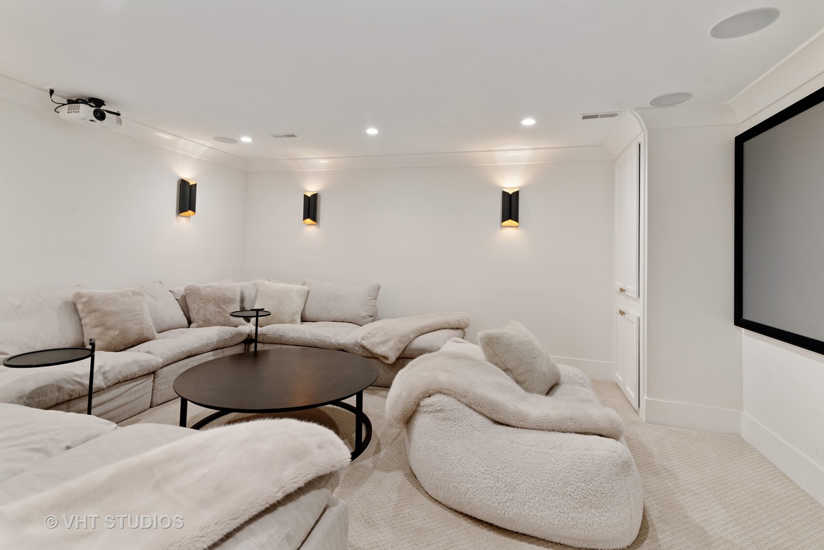 300 Greenleaf Avenue Wilmette, IL 60091 - Photo 28 of 43 a living room with furniture and a flat screen tv