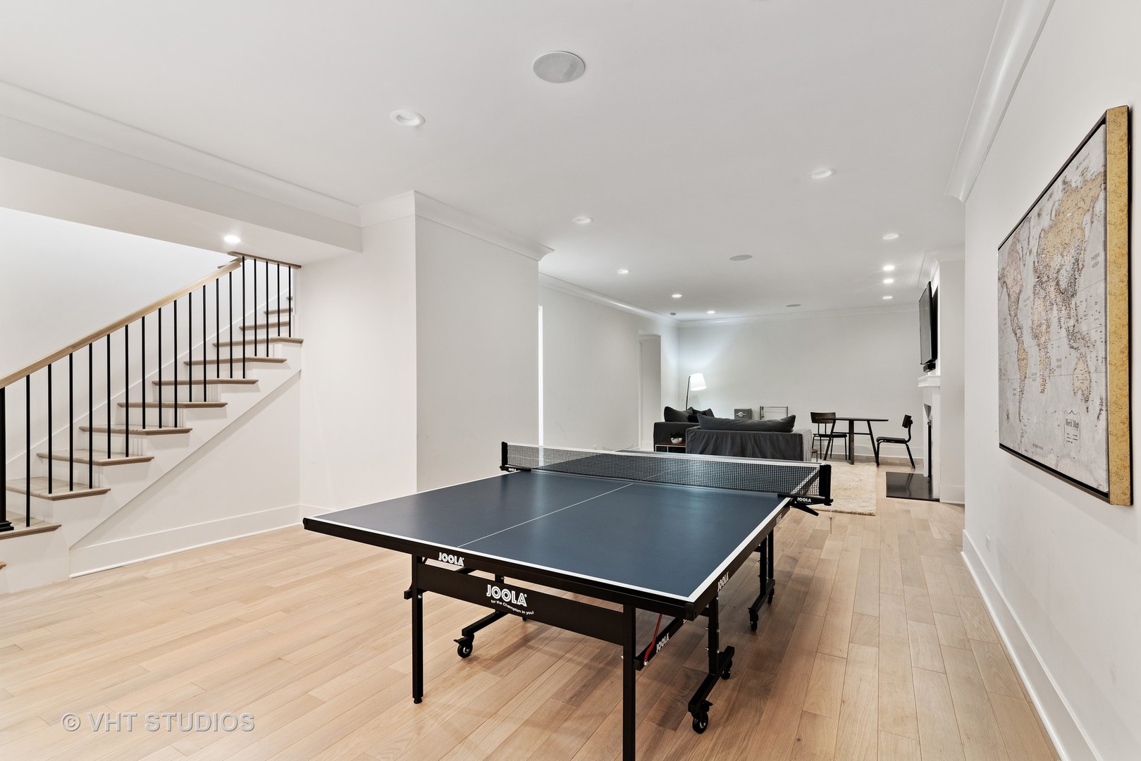300 Greenleaf Avenue Wilmette, IL 60091 - Photo 30 of 43 a dining hall with stainless steel appliances a dining table wooden floor and a rug