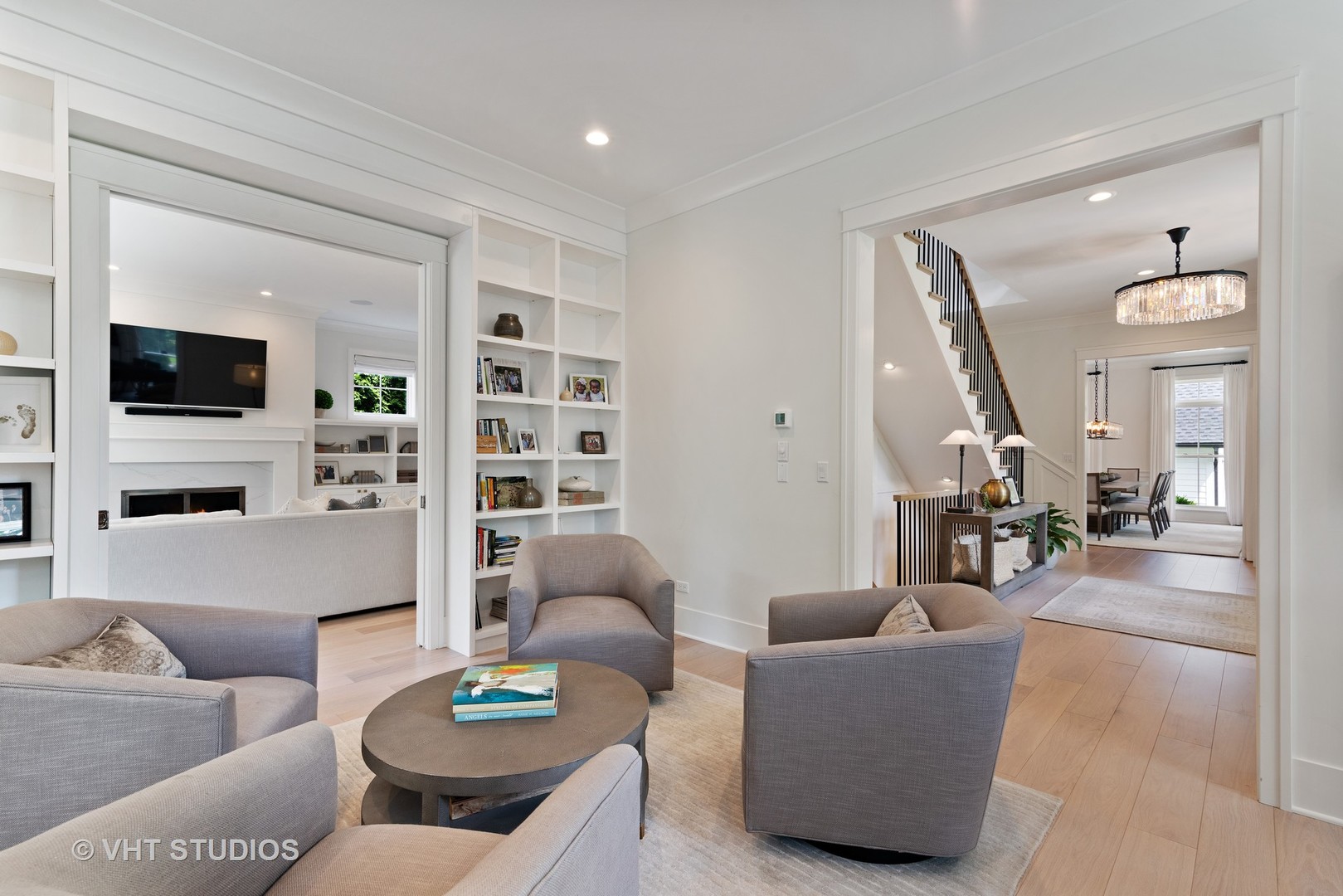 300 Greenleaf Avenue Wilmette, IL 60091 - Photo 4 of 43 a living room with furniture and a flat screen tv