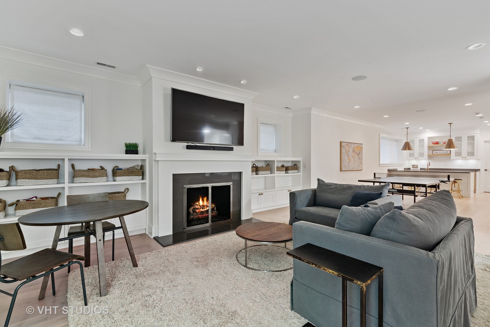 300 Greenleaf Avenue Wilmette, IL 60091 - Photo 31 of 43 a living room with furniture a flat screen tv and a fireplace