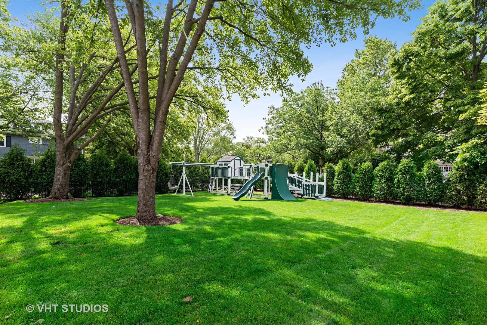 300 Greenleaf Avenue Wilmette, IL 60091 - Photo 39 of 43 a view of a grassy field with trees in the background