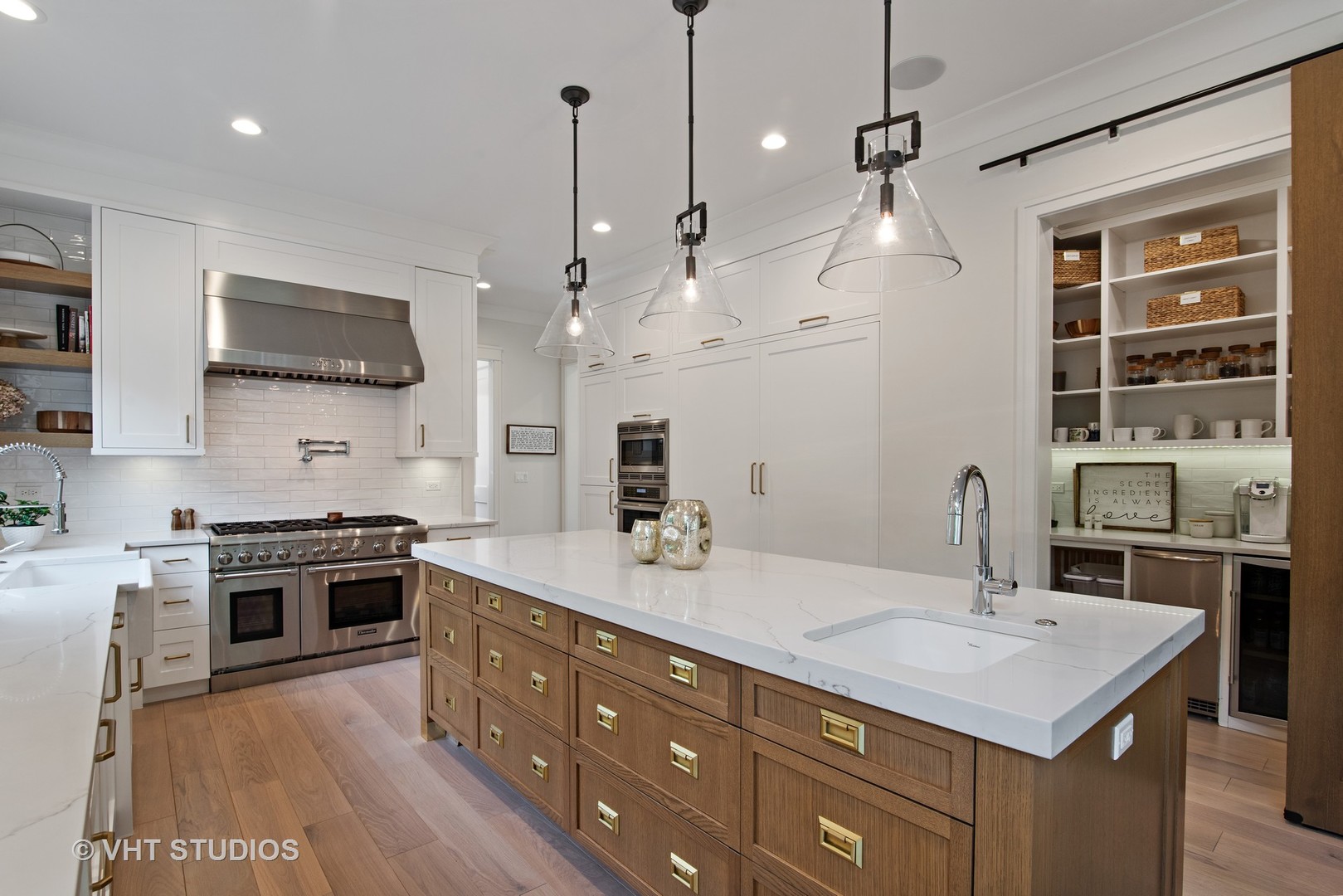 300 Greenleaf Avenue Wilmette, IL 60091 - Photo 6 of 43 a kitchen with a stove a sink and a refrigerator
