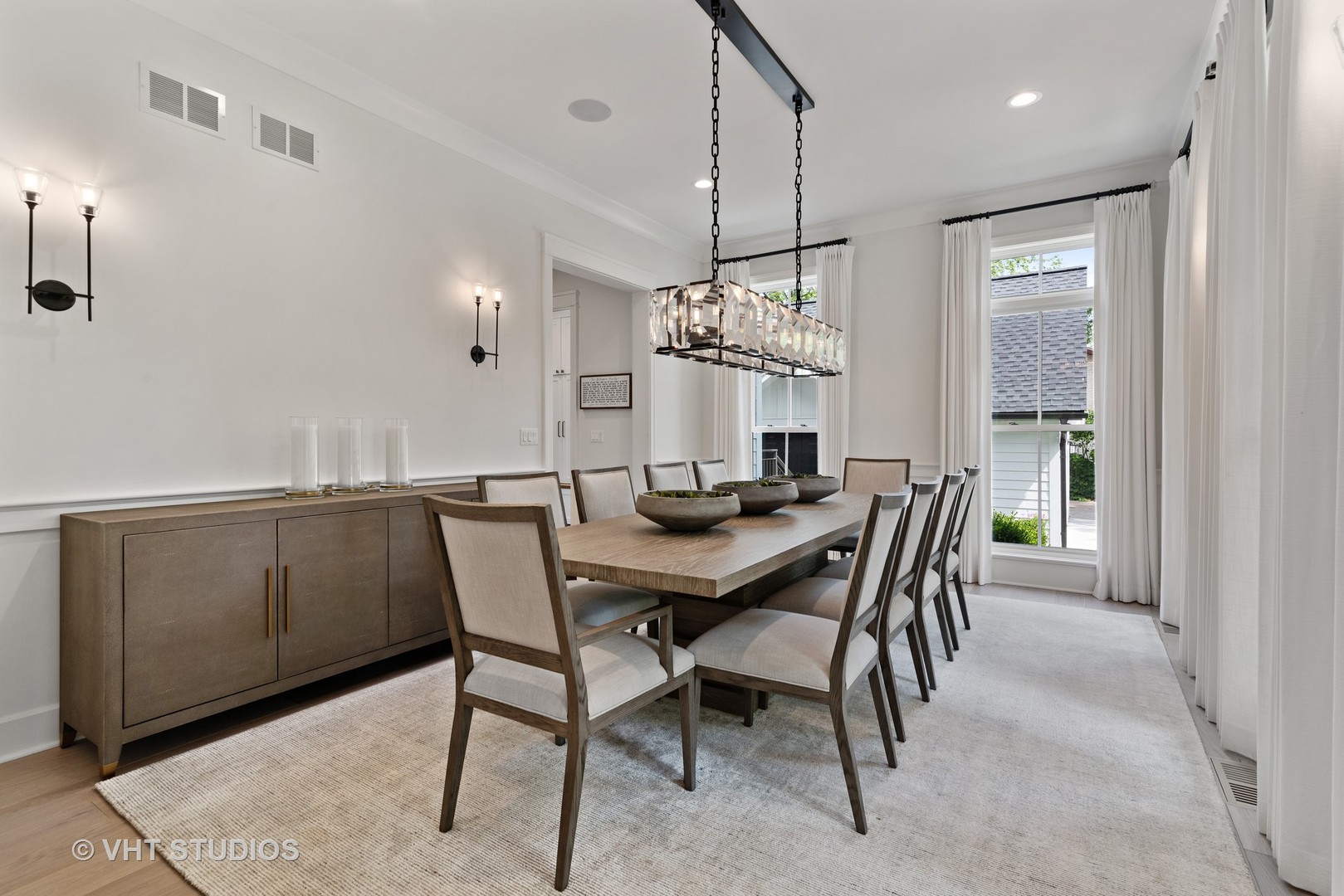 300 Greenleaf Avenue Wilmette, IL 60091 - Photo 9 of 43 a view of a dining room with furniture window and wooden floor