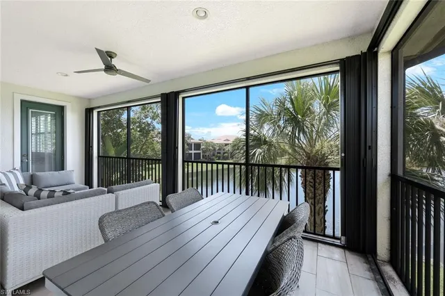 a view of balcony with furniture