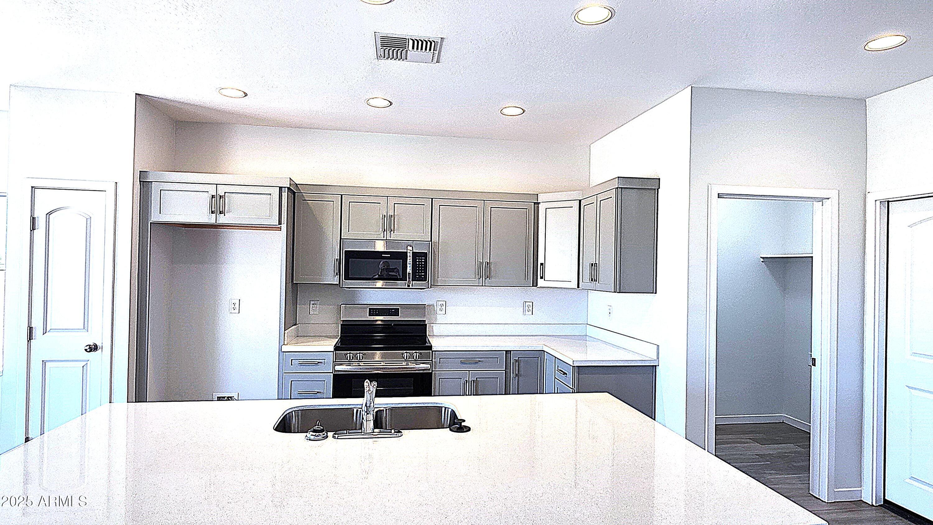 22270 West Skinner Road Wittmann, AZ 85361 - Photo 8 of 21 1651 PLAN KITCHEN 2