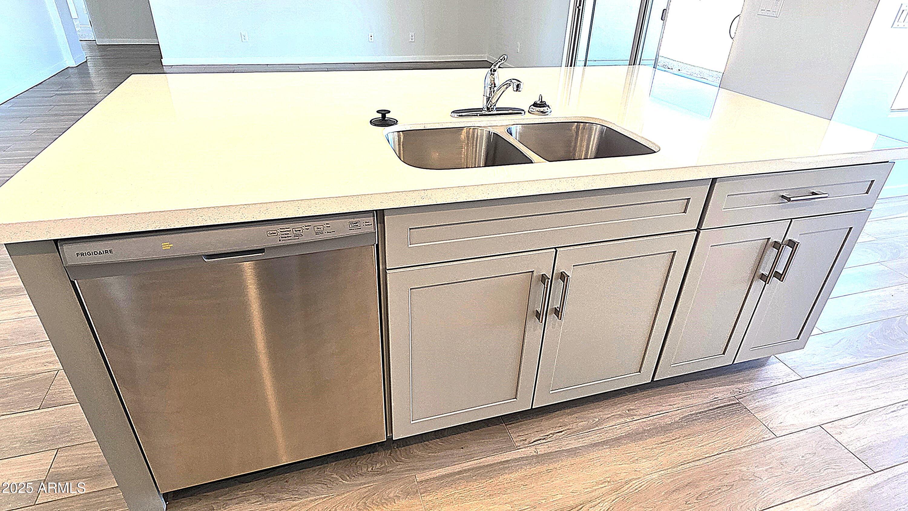 22270 West Skinner Road Wittmann, AZ 85361 - Photo 9 of 21 1651 PLAN KITCHEN ISLAND 2