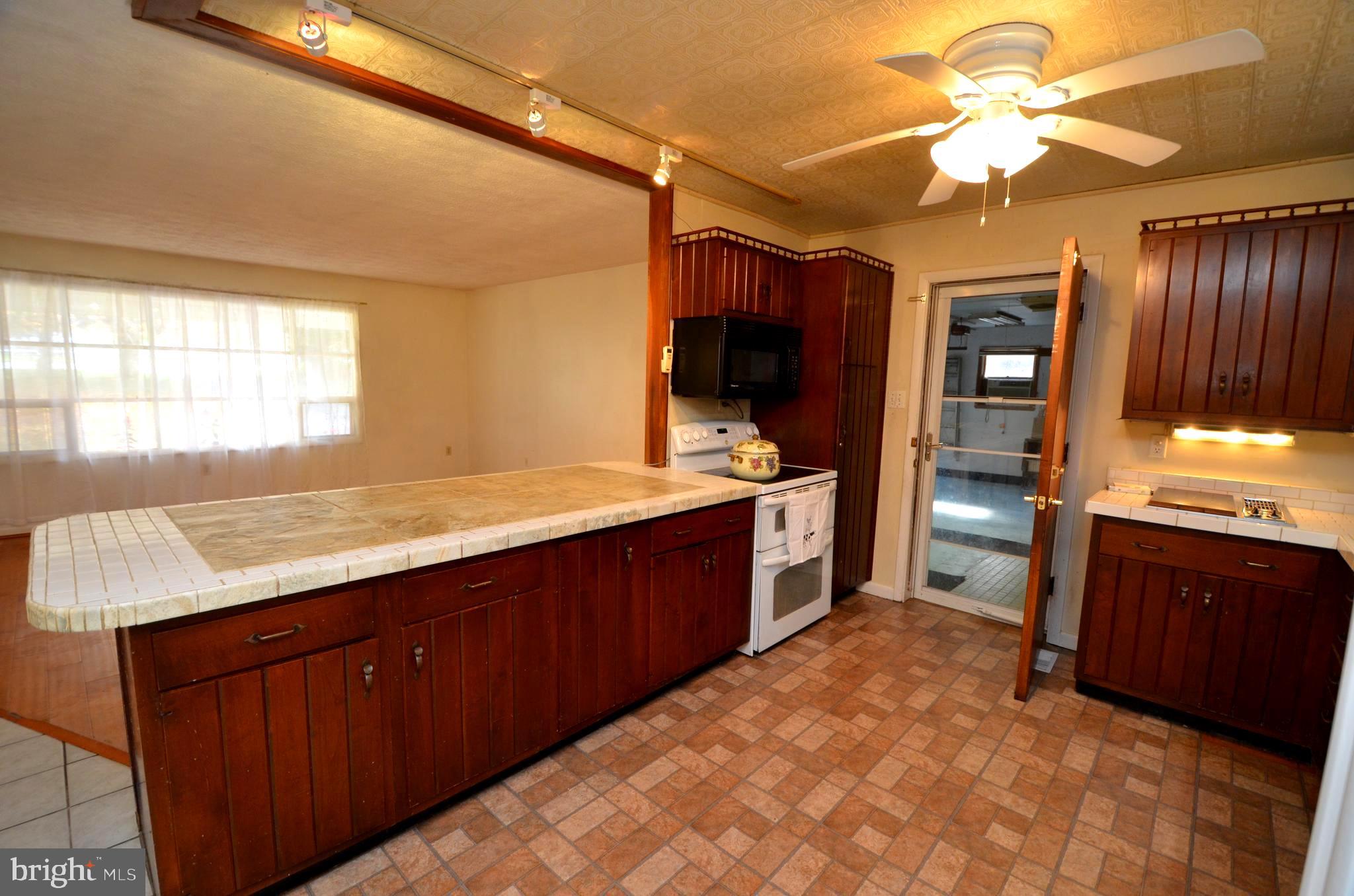 5360 Solomons Island Road Huntingtown, MD 20639 - Photo 12 of 46 Kitchen with entrance to garage