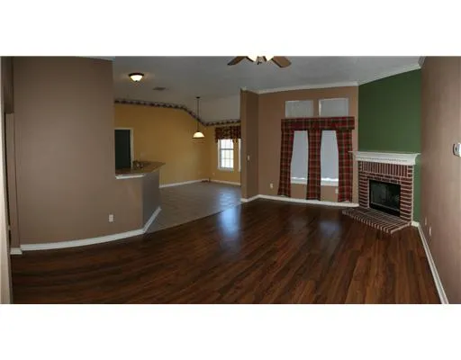 a black and white photo of a living room