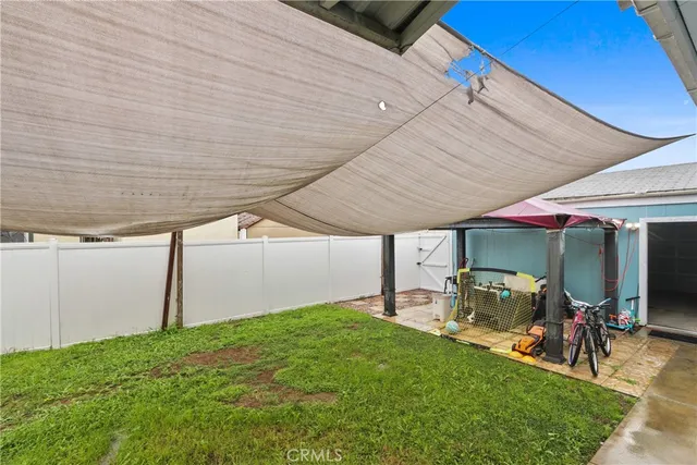 a view of a backyard of a house