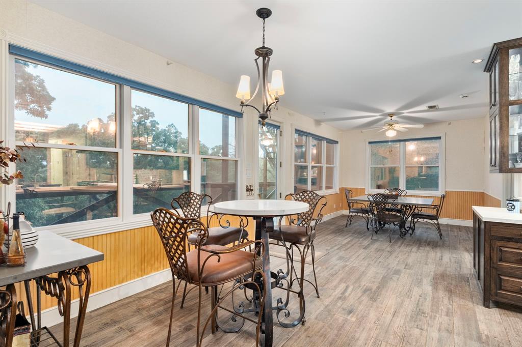 10080 Arvin Hill Road Aubrey, TX 76227 - Photo 21 of 40 a view of a dining room with furniture window and outside view