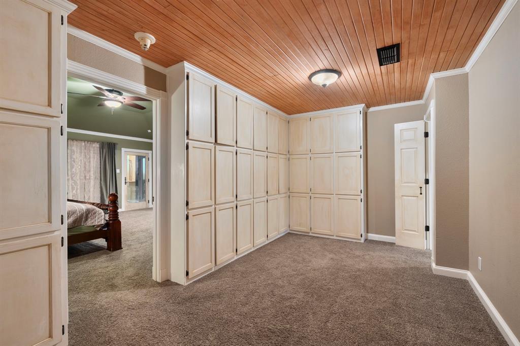 10080 Arvin Hill Road Aubrey, TX 76227 - Photo 27 of 40 a view of a livingroom with a staircase