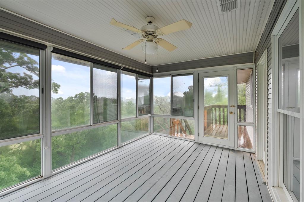 10080 Arvin Hill Road Aubrey, TX 76227 - Photo 29 of 40 a view of porch with a floor to ceiling window