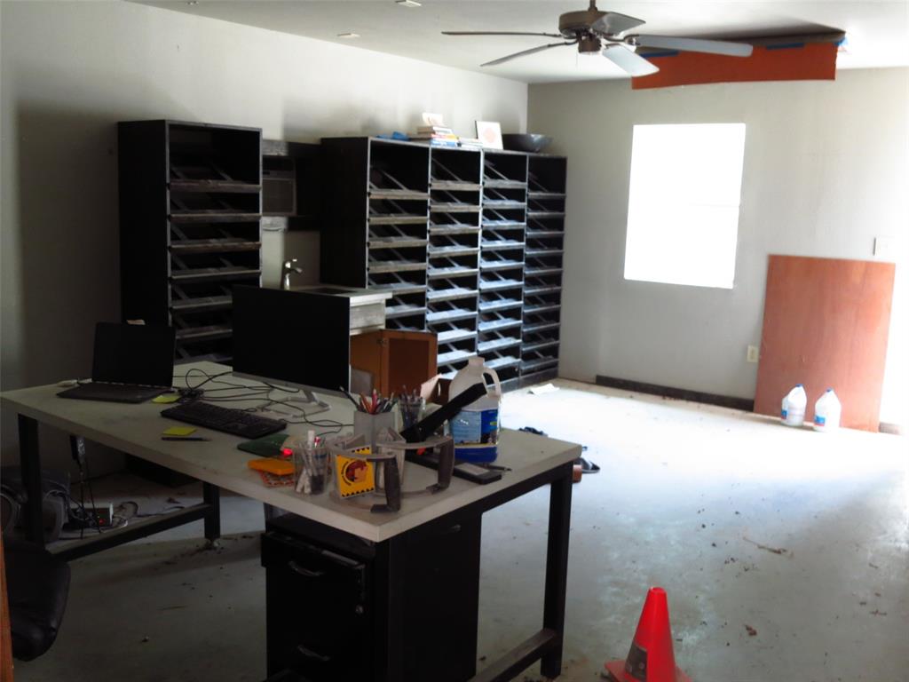 10080 Arvin Hill Road Aubrey, TX 76227 - Photo 38 of 40 a view of a workspace with furniture