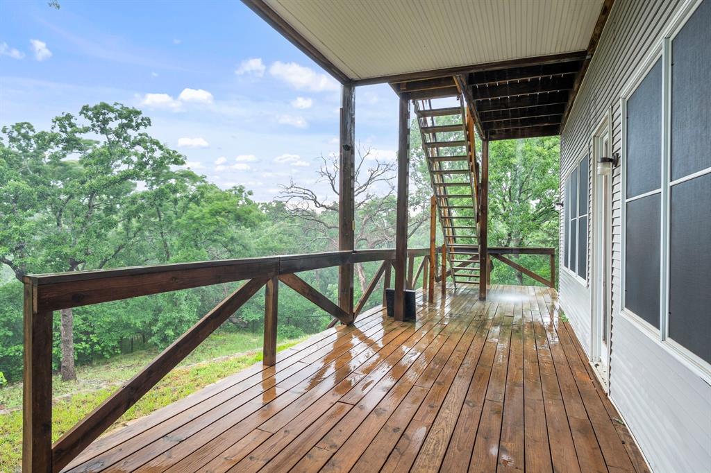 10080 Arvin Hill Road Aubrey, TX 76227 - Photo 5 of 40 a view of balcony with wooden floor