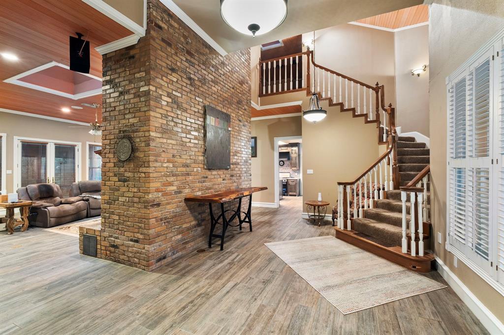 10080 Arvin Hill Road Aubrey, TX 76227 - Photo 10 of 40 a view of entryway livingroom and hall with wooden floor