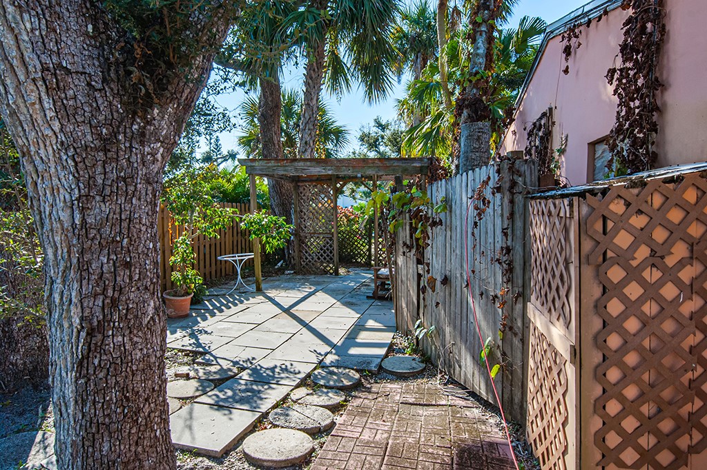 575 Acacia Road Vero Beach, FL 32963 - Photo 15 of 28 a view of an outdoor space with a patio