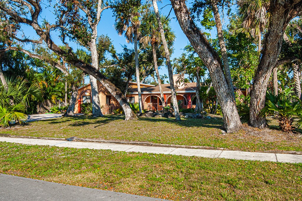 575 Acacia Road Vero Beach, FL 32963 - Photo 17 of 28 a view of a park with large trees