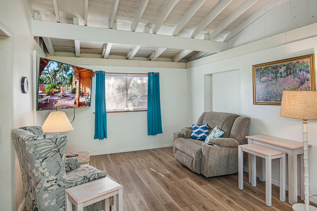 575 Acacia Road Vero Beach, FL 32963 - Photo 20 of 28 a living room with furniture and a large window