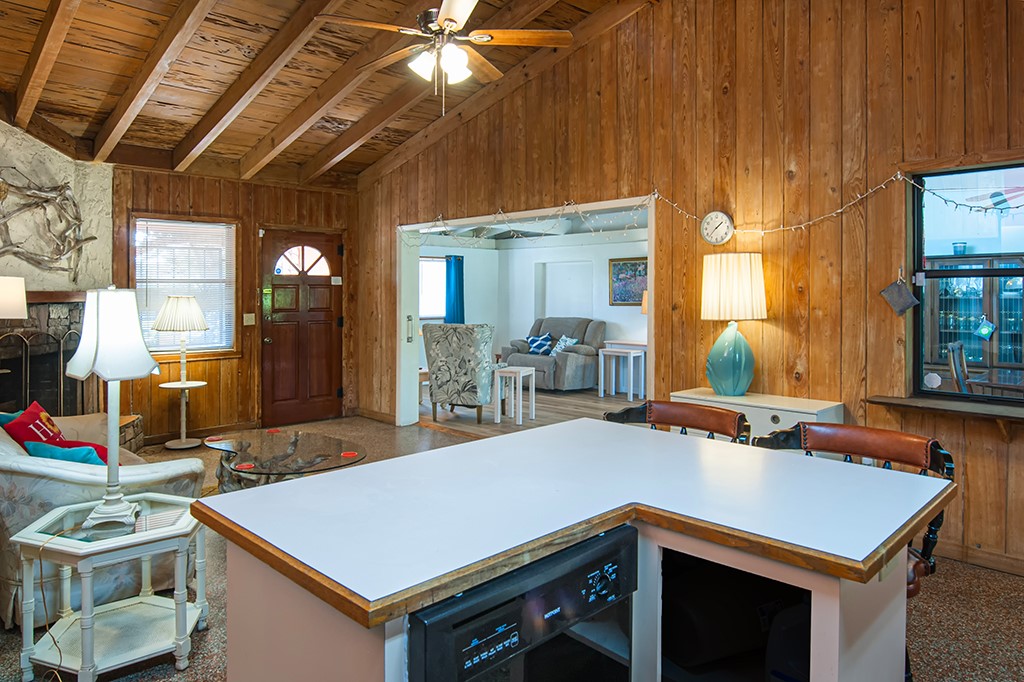 575 Acacia Road Vero Beach, FL 32963 - Photo 9 of 28 a kitchen with a sink cabinets and wooden floor