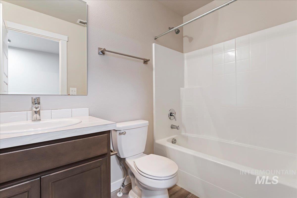 2501 East Goldstone Street Meridian, ID 83642 - Photo 16 of 26 Full bathroom with vanity and shower / washtub combination