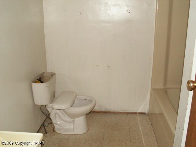 152 Mattioli Road Bartonsville, PA 18321 - Photo 4 of 9 a bathroom with a toilet and a sink