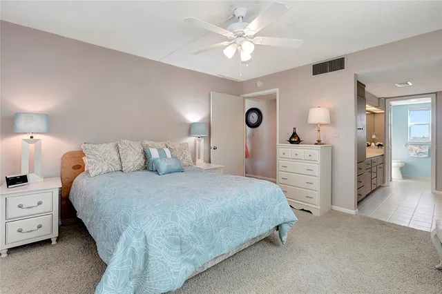 a view of a lake with tall building