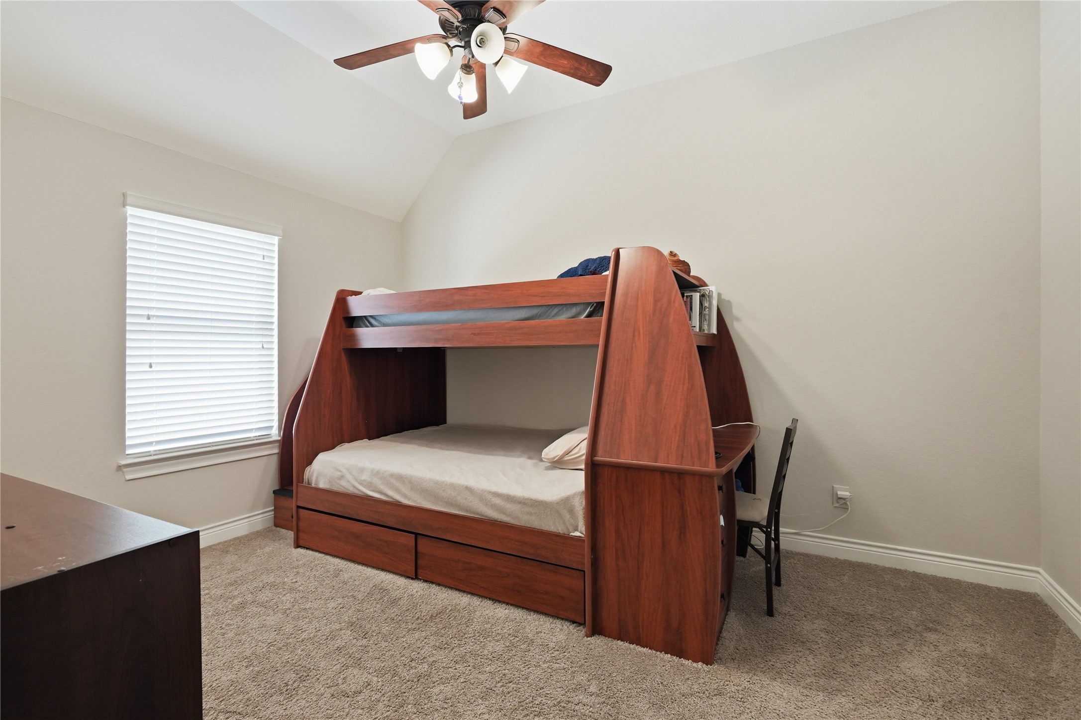 6429 Remlap Street Houston, TX 77055 - Photo 20 of 30 Secondary bedroom featuring soft natural light, a simple layout, and a calm, welcoming feel.