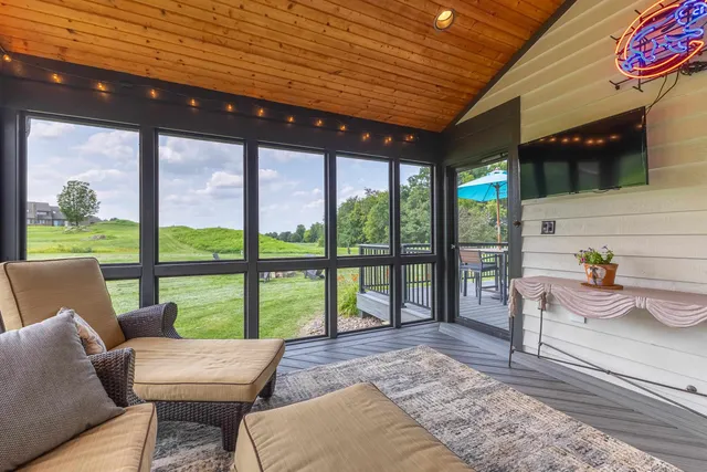 a kitchen with granite countertop a sink and a stove