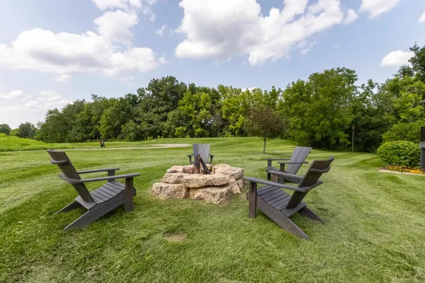 a outdoor living space with furniture and garden view
