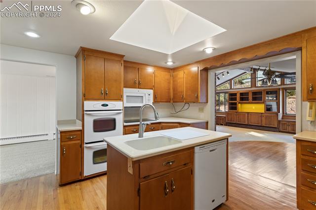 2675 North Chelton Road Colorado Springs, CO 80909 - Photo 11 of 30 Kitchen Opens to F/R and D/R!