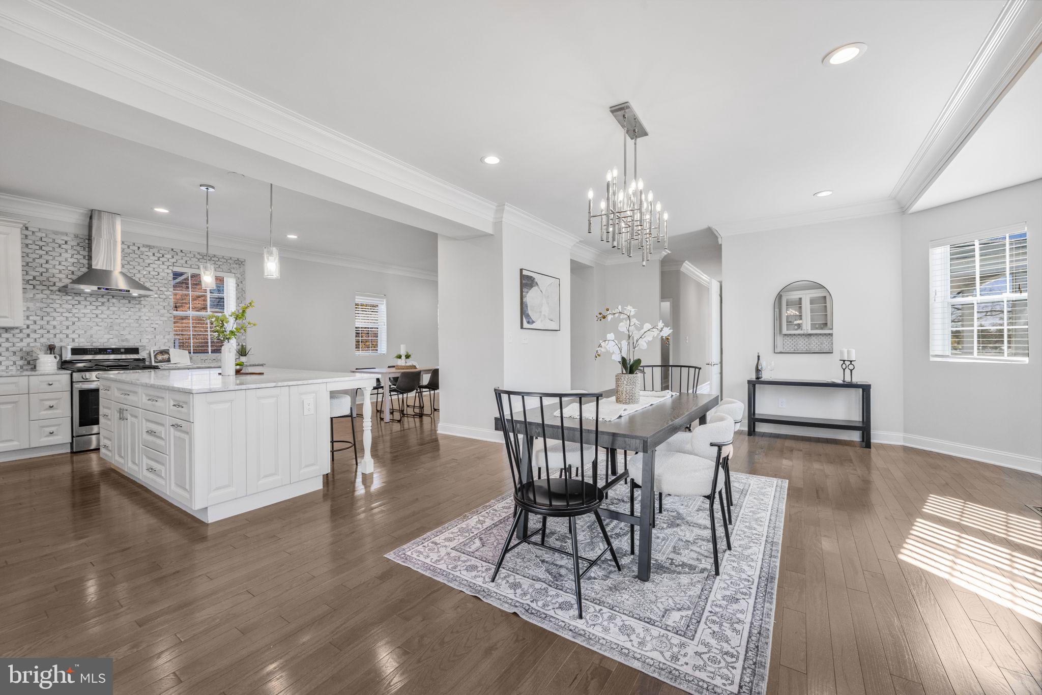2420 West Rogers Avenue Baltimore, MD 21209 - Photo 13 of 67 a view of a dining room with furniture and wooden floor
