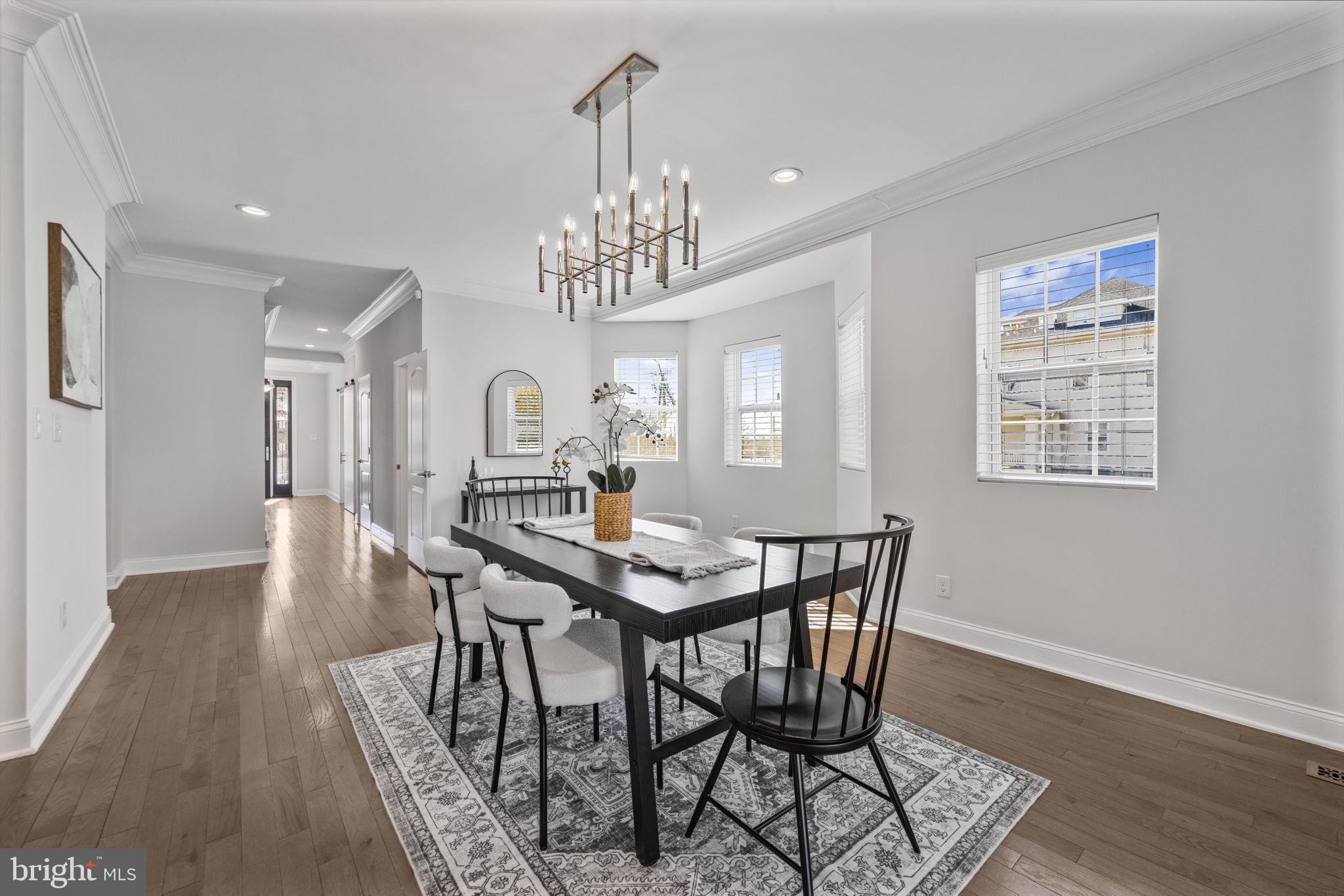 2420 West Rogers Avenue Baltimore, MD 21209 - Photo 14 of 67 a view of a dining room with furniture window and wooden floor