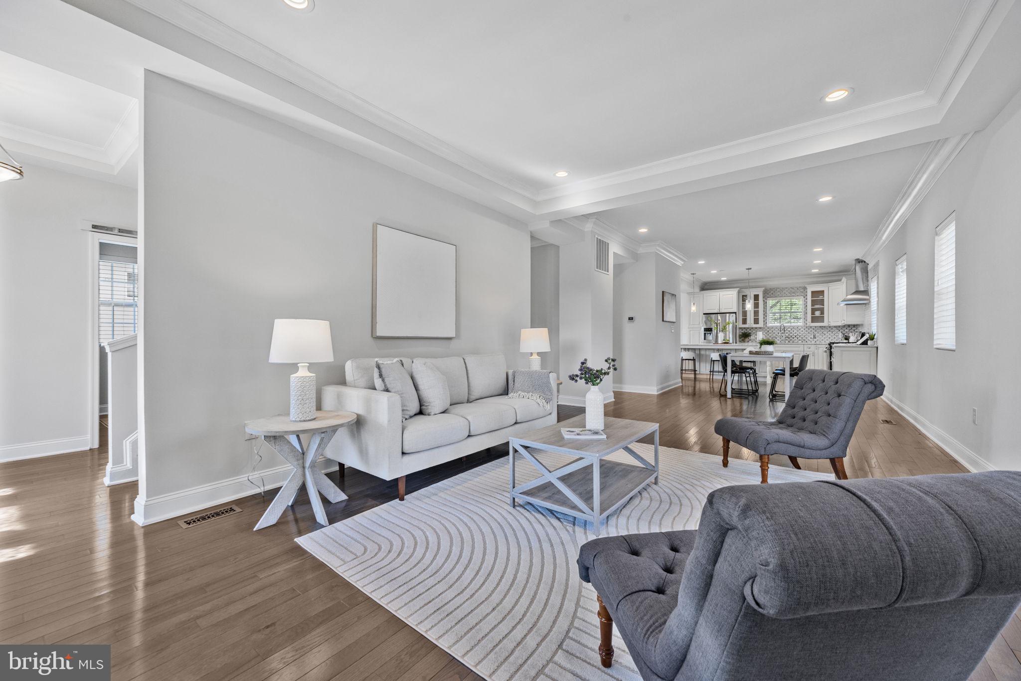 2420 West Rogers Avenue Baltimore, MD 21209 - Photo 19 of 67 a living room with furniture and wooden floor