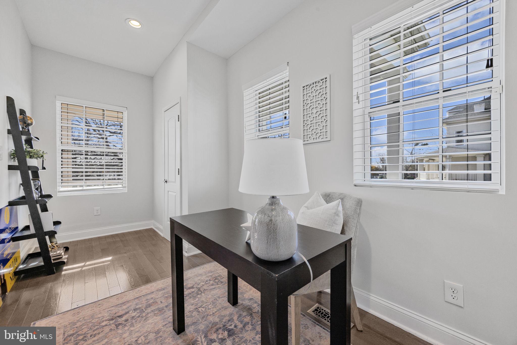 2420 West Rogers Avenue Baltimore, MD 21209 - Photo 21 of 67 a view of a workspace with furniture and a window