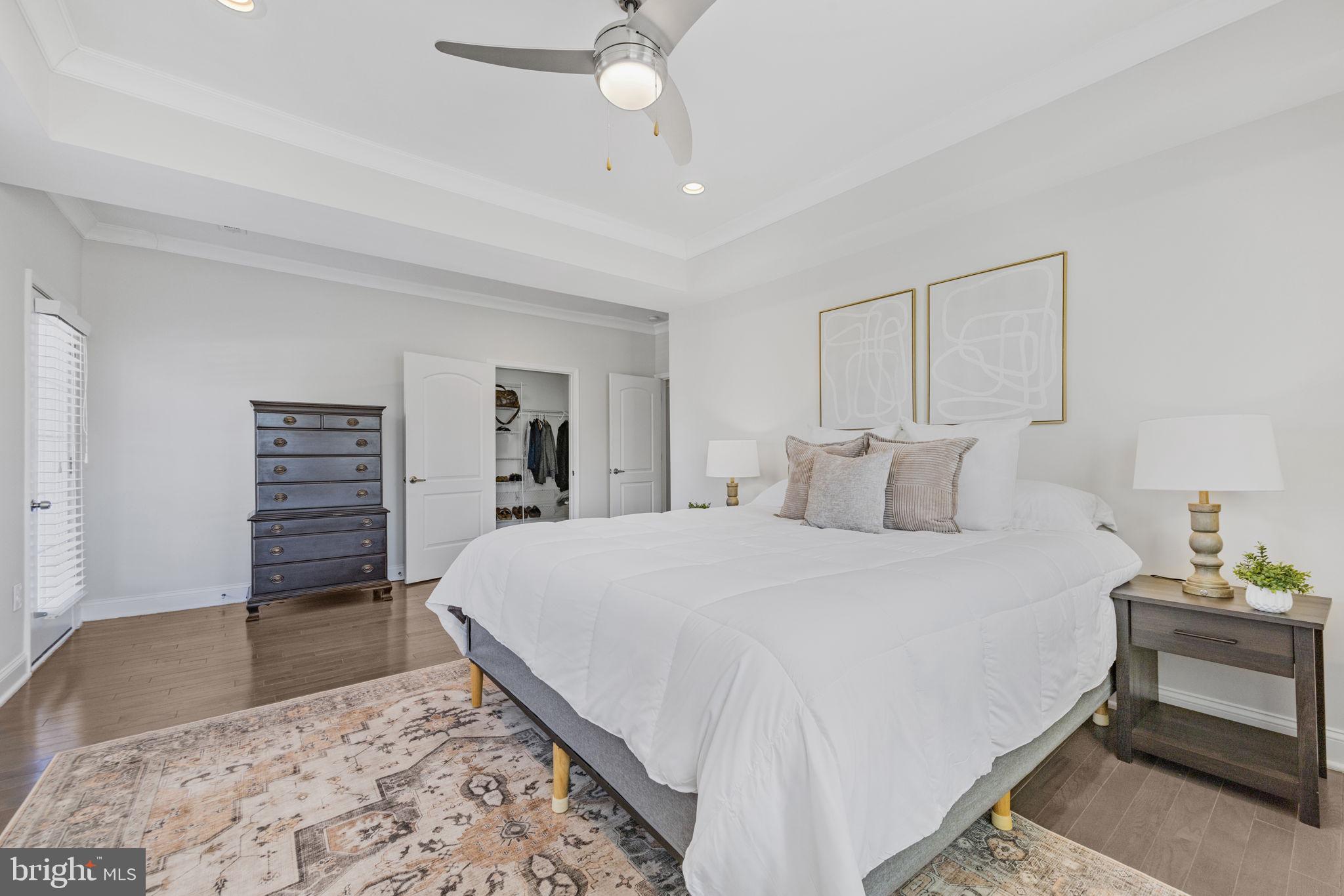 2420 West Rogers Avenue Baltimore, MD 21209 - Photo 26 of 67 a bedroom with a bed and a dresser